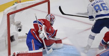 Tampa Bay Lightning's Nikita Kucherov scores on Montreal Canadiens goaltender Carey Price during the second period of Game 3 of the NHL hockey Stanley Cup Final, Montreal, U.S., July 2, 2021. (Ryan Remiorz/The Canadian Press via AP)