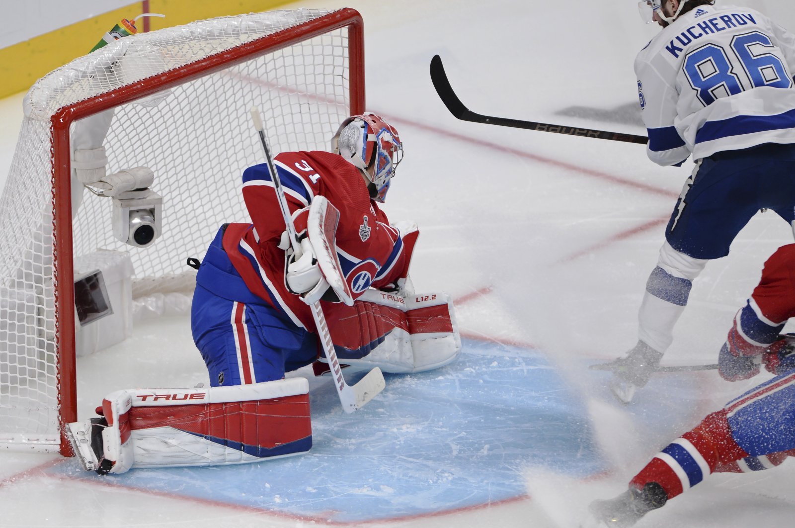 Tampa Bay Lightning's Nikita Kucherov scores on Montreal Canadiens goaltender Carey Price during the second period of Game 3 of the NHL hockey Stanley Cup Final, Montreal, U.S., July 2, 2021. (Ryan Remiorz/The Canadian Press via AP)
