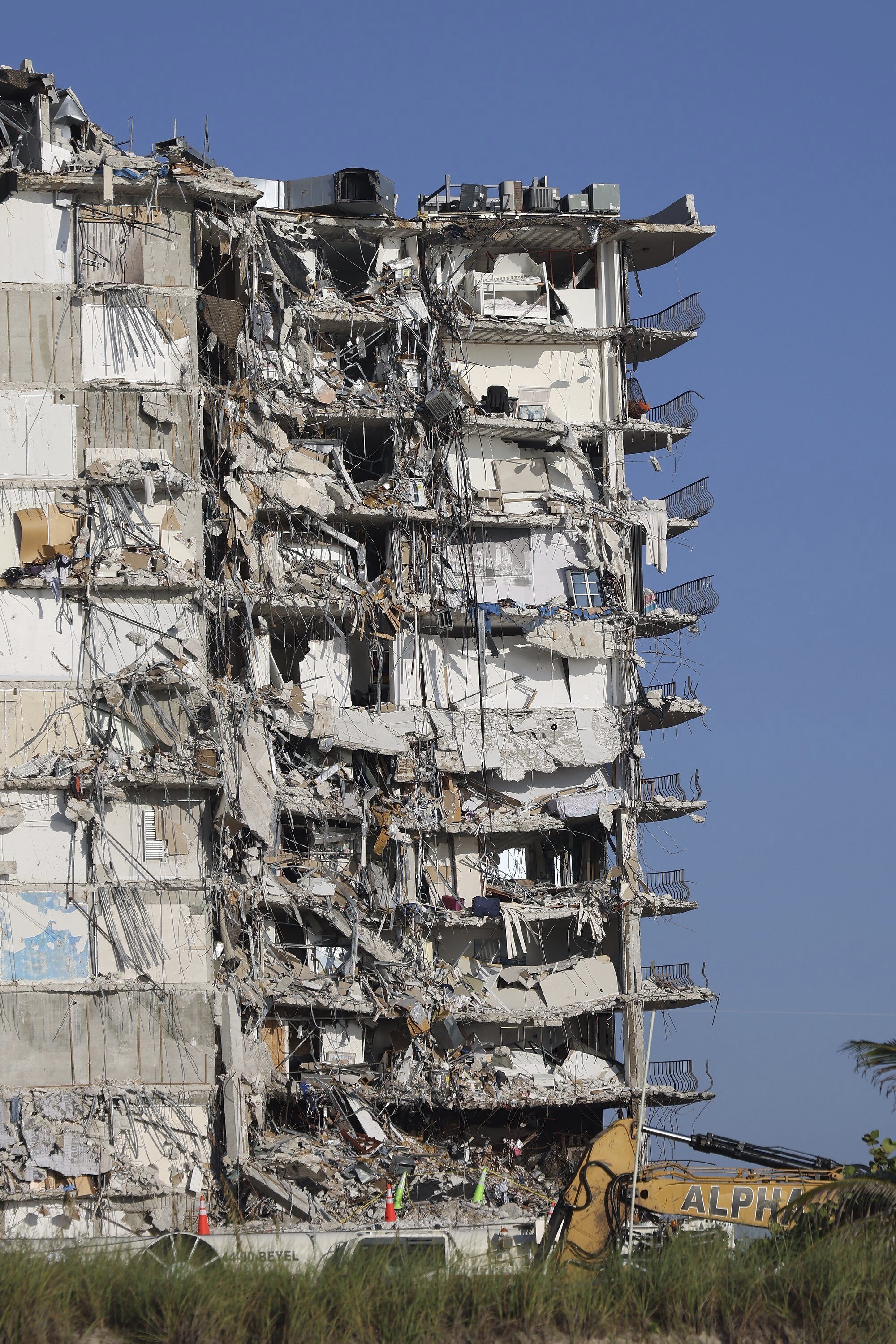 The remaining debris of the collapsed Champlain Towers South is seen as the rescue operation slows down in preparation for the demolition, Surfside, Florida, U.S., July 4, 2021. (AP Photo)