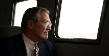 U.S. Secretary of Defense Donald Rumsfeld looks through a window of an armored vehicle while touring Abu Ghraib prison outside Baghdad, Iraq, May 13, 2004. (Reuters Photo)