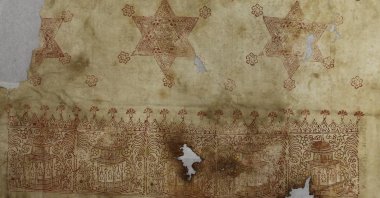 Textile with small kiosks and palm trees and strap-work stars, linen, block printed, with applied gold foil and two inspection seals, from Ottoman Egypt, 1600s or 1700s. (Courtesy of Bolton Library and Museum Services)