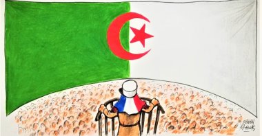 Illustration by Erhan Yalvaç shows a man with French-flagged hat confronting the Algerian flag, symbolizing the tension between France and Algeria.