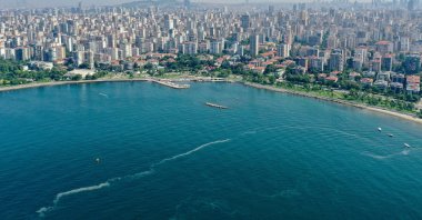 A slim trail of sea snot is visible off the newly cleaned coast of Caddebostan, in Istanbul, Turkey, July 1, 2021. (AA PHOTO)