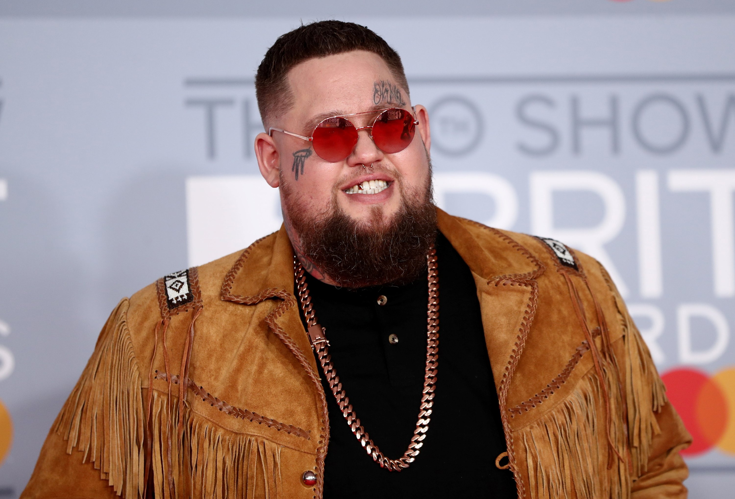 Rag'n'Bone Man poses as he arrives for the Brit Awards at the O2 Arena in London, U.K., Feb. 18, 2020. (Reuters Photo)