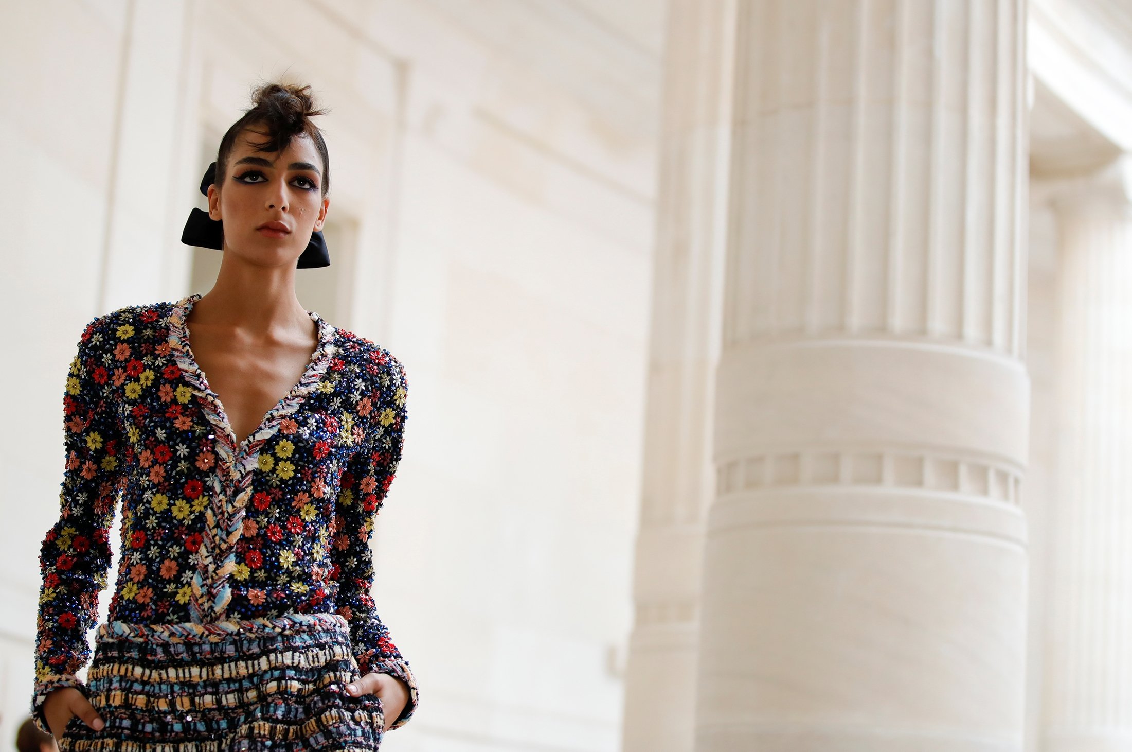 Chanel, Armani imbue Paris fashion shows with colors, flowers