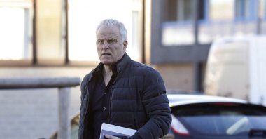 Dutch crime reporter Peter R. de Vries arrives at the heavily secured courtroom in Amsterdam, the Netherlands, Feb. 15, 2019. (AFP Photo)