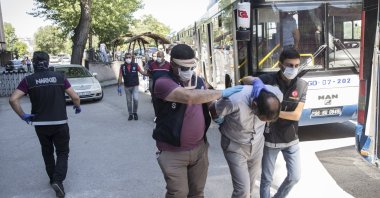 Police escort suspects captured in Operation Swamp to the courthouse in the capital, Ankara, Turkey, July 5, 2020. (AA PHOTO)