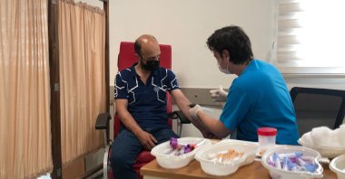A volunteer is injected with a VLP-based vaccine, in Istanbul, Turkey, July 5, 2021. (DHA PHOTO)
