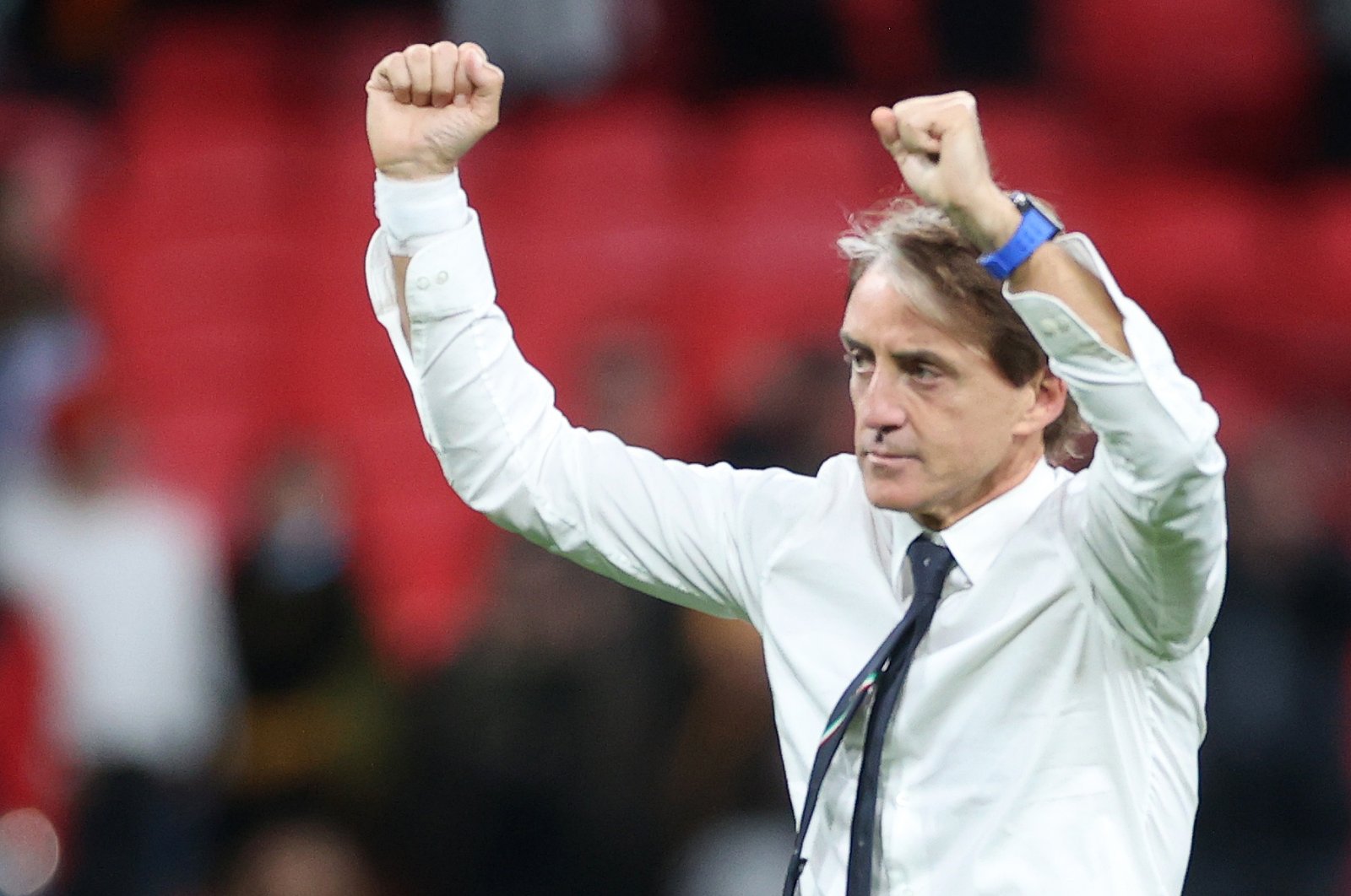 Italy coach Roberto Mancini celebrates after winning the Euro 2020 semifinal against Spain, Wembley Stadium, London, England, July 6, 2021. (Reuters Photo)