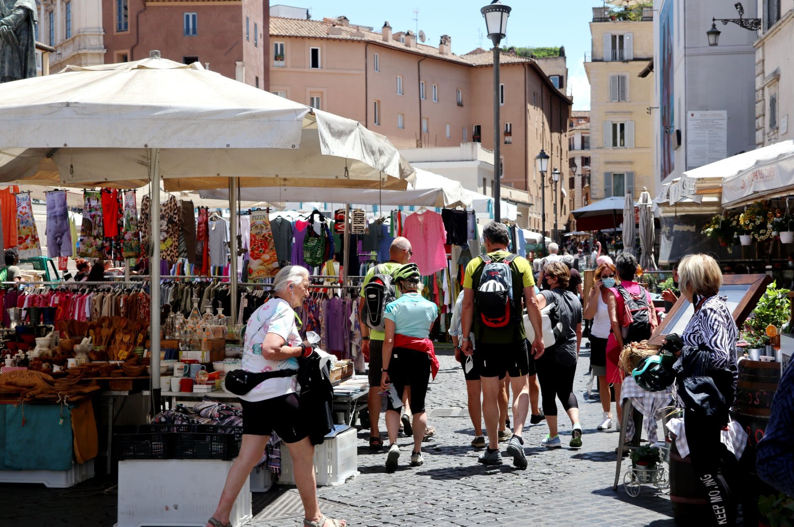 Tourists are seen at Campo de' Fiori traditional market, Rome, Italy, June 1, 2021. (Reuters Photo)