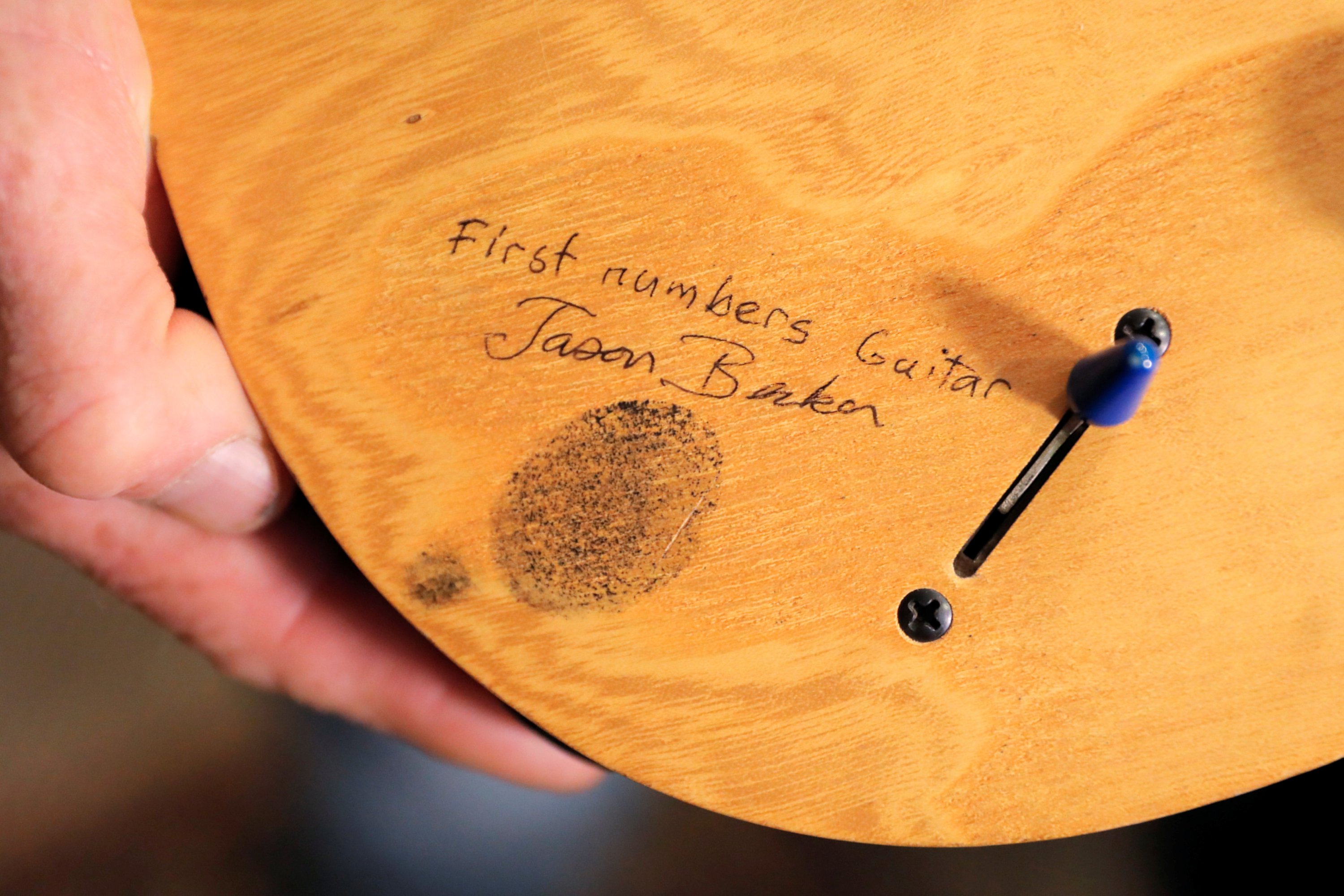 The thumbprint of guitar player Jason Becker is seen on his "Numbers" guitar at Guernsey