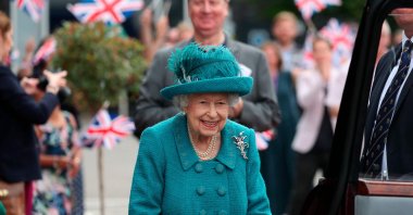 Britain's Queen Elizabeth II visits the set of the long-running television series "Coronation Street" in Manchester, northwest England, July 8, 2021. (AFP Photo)