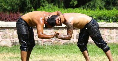 Wrestlers prepare to compete in the 660th Kırkpınar Oil Wrestling Festival, Edirne, Turkey, July 8, 2021. (AA Photo)