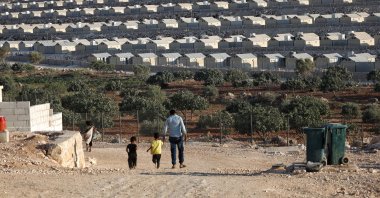 Daily life of displaced Syrians in Kafr Jales camp near the city of Idlib, northwest Syria, on July 7, 2021 (Getty Images)