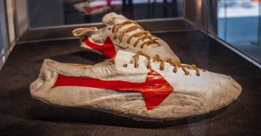 This handout photo released by Sotheby's shows a pair of "prototype logo" track spikes running shoes handmade by Nike co-founder Bill Bowerman for Canadian sprinter and Olympian Harry Jerome in the 1960s, New York, U.S., July 7, 2021. (Sotheby's/AFP Photo)