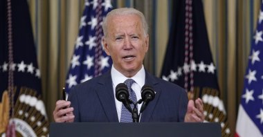 U.S. President Joe Biden speaks before signing an executive order aimed at promoting competition in the economy, in the State Dining Room of the White House, Washington, July 9, 2021. (AP Photo)