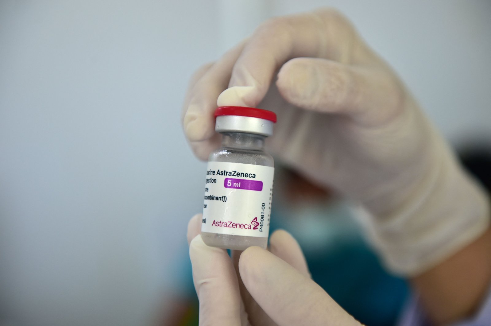 A nurse holds up a vial of the AstraZeneca/Oxford COVID-19 coronavirus vaccine in Thailand, July 9, 2021. ( AFP Photo)