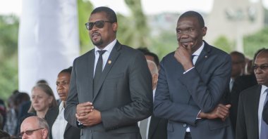 Joseph Lambert (R) seen here in 2018 attending a ceremony to remember the earthquake of 2010, Port-au-Prince, Haiti, Jan. 12, 2018. (EPA-EFE/JEAN MARC HERVE ABELARD)