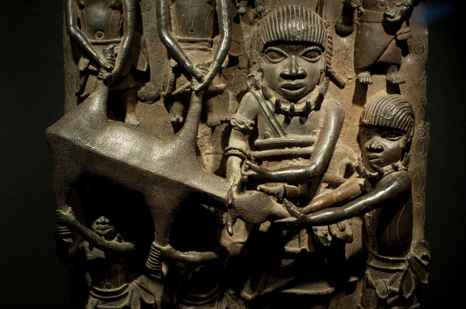 Brass plaques that show the oba (king) with other people of Benin, aprox. 1600-1500 B.C., Madrid, Spain, Jan. 16, 2010. (Shutterstock Photo)