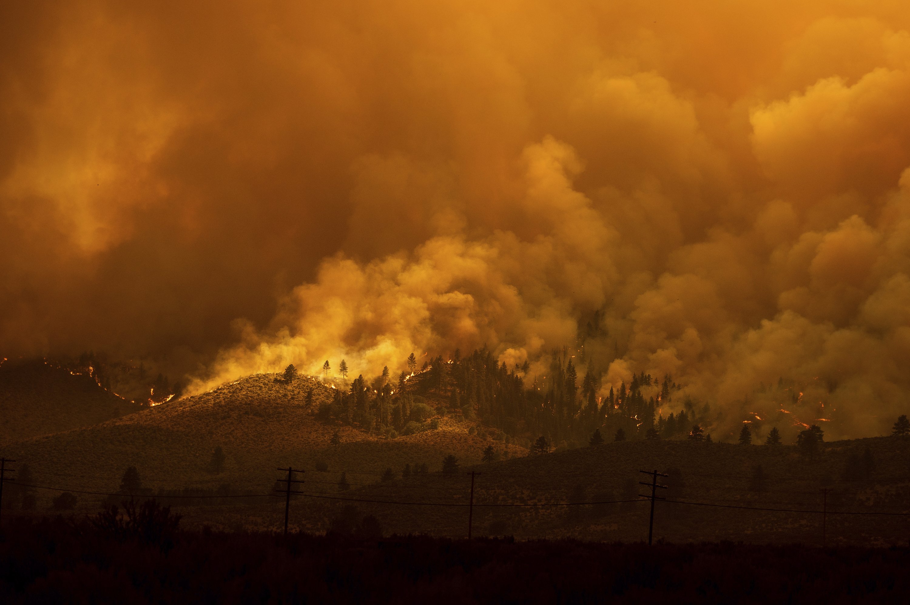 The Sugar Fire, part of the Beckwourth Complex Fire, burns in Doyle, California, U.S., July 10, 2021. (AP Photo)