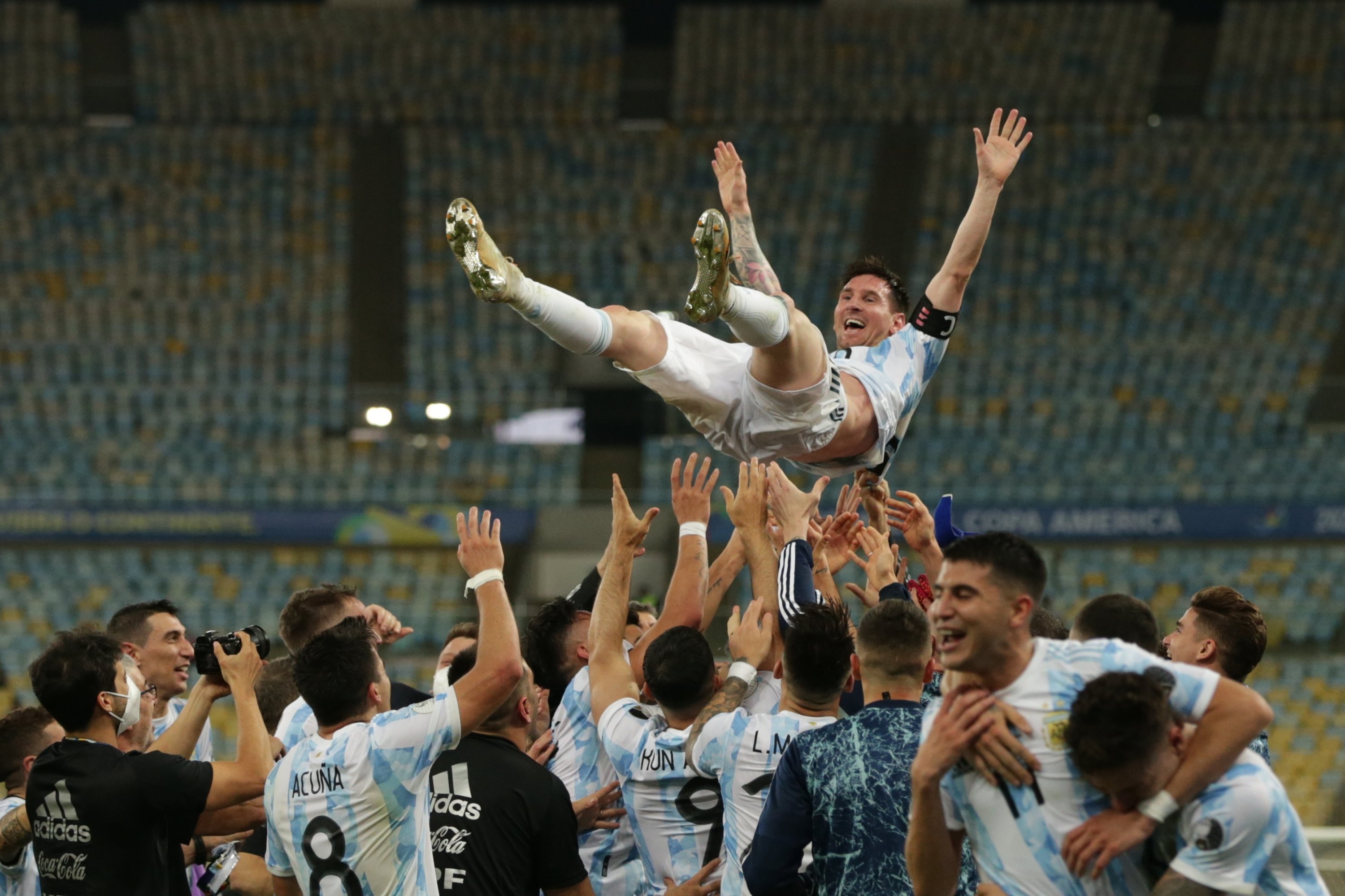 Argentina players toss Lionel Messi in the air as they celebrate their victory against Brazil in the Copa America final match at Maracana Stadium in Rio de Janeiro, Brazil, July 10, 2021. (EPA Photo)