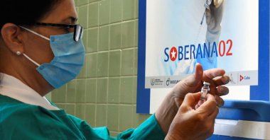 A nurse prepares a Cuban Soberana 2 vaccine candidate to be administered to a volunteer during its trial Phase III in Havana, Cuba, March 31, 2021. (AFP File Photo)