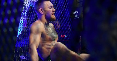 Irish MMA star Conor McGregor reacts following an injury suffered against Dustin Poirier during UFC 264 at T-Mobile Arena, Las Vegas, U.S., July 10, 2021.