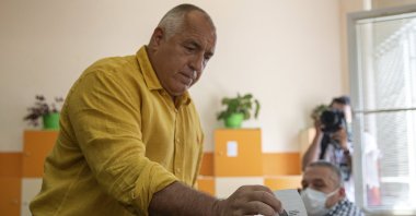 Bulgarian former prime minister Boyko Borissov casts his vote during parliamentary elections in the town of Bankya near capital Sofia, Bulgaria on Sunday, July 11, 2021. (AP Photo)