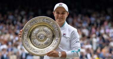 Australia's Ashleigh Barty poses as she celebrates with the trophy after winning the Wimbledon final against Czech Republic's Karolina Pliskova, All England Tennis Club, London, England, July 10, 2021.