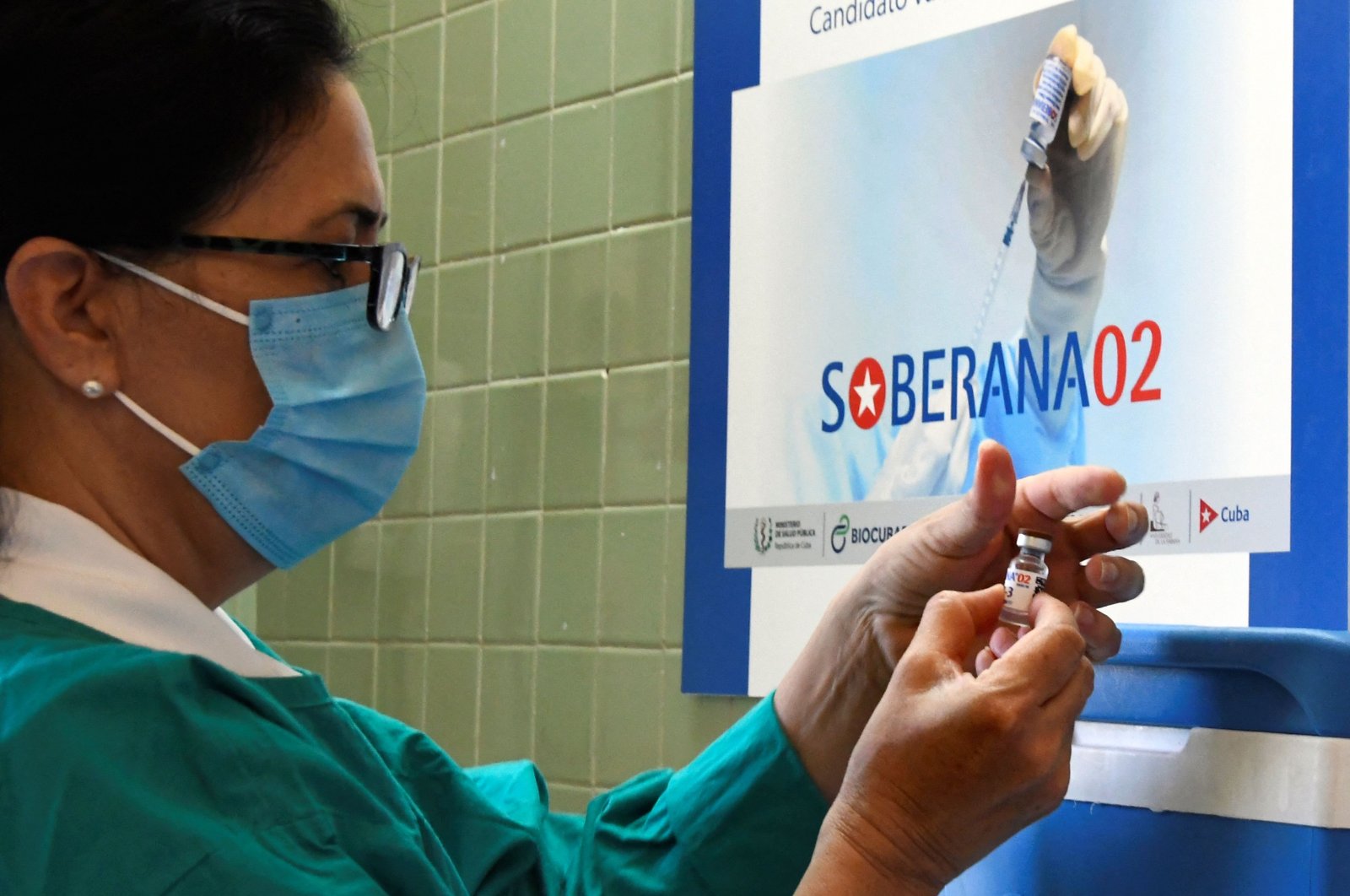A nurse prepares a Cuban Soberana 2 vaccine candidate to be administered to a volunteer during its trial Phase III in Havana, Cuba, March 31, 2021. (AFP File Photo)