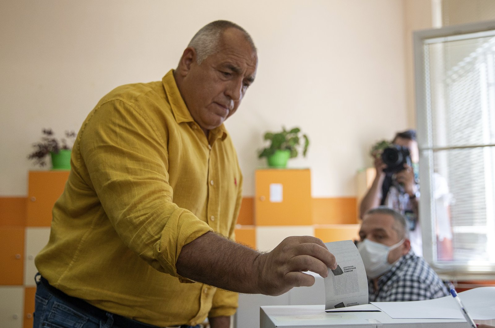 Bulgarian former prime minister Boyko Borissov casts his vote during parliamentary elections in the town of Bankya near capital Sofia, Bulgaria on Sunday, July 11, 2021. (AP Photo)