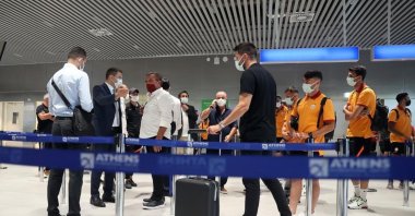 Galatasaray squad is seen waiting at the Athens International Airport in this photo taken on July 12 (Photo taken from Twitter / Galatasaray)