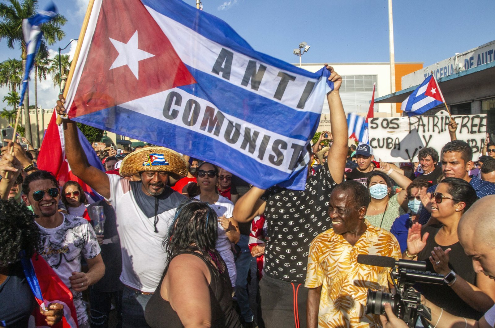 Cuban exiles rally at Versailles restaurant in Miami's Little Havana in support of protesters in Cuba as thousands of Cubans took to the streets in rare protests, Miami, Florida, U.S., Sunday, July 11, 2021. (AP Photo)