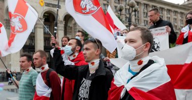 Participants stage a performance in support of Belarusian prisoner Stepan Latypov during a rally demanding the release of all underage activists detained during recent anti-government protests in Belarus, central Kyiv, Ukraine June 1, 2021. (Reuters Photo)