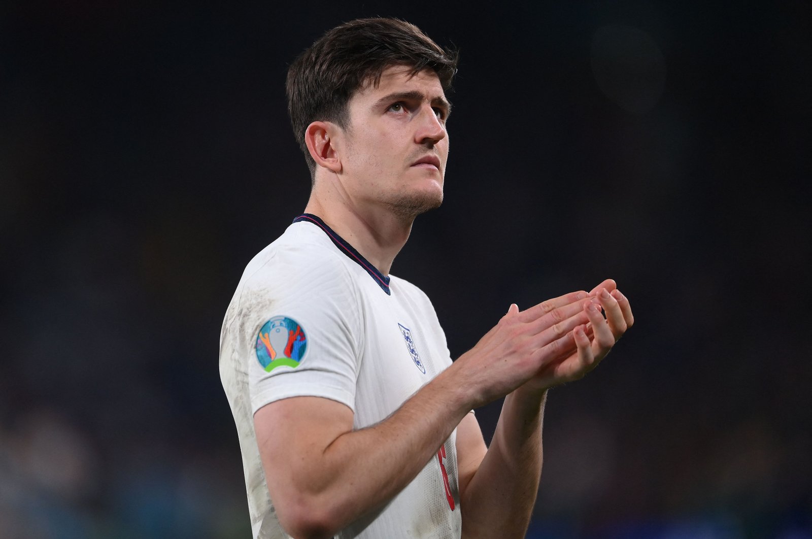 England defender Harry Maguire greets the fans after their loss in the UEFA Euro 2020 final football against Italy at the Wembley Stadium, London, U.K., July 11, 2021. (AFP Photo)