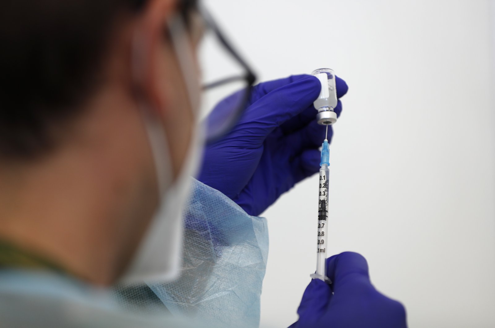 A nurse prepares doses of the Johnson & Johnson vaccine at an inoculation center operated by the Portuguese armed forces at Lisbon University's sports stadium, Lisbon, Portugal, June 23, 2021. (AP Photo)
