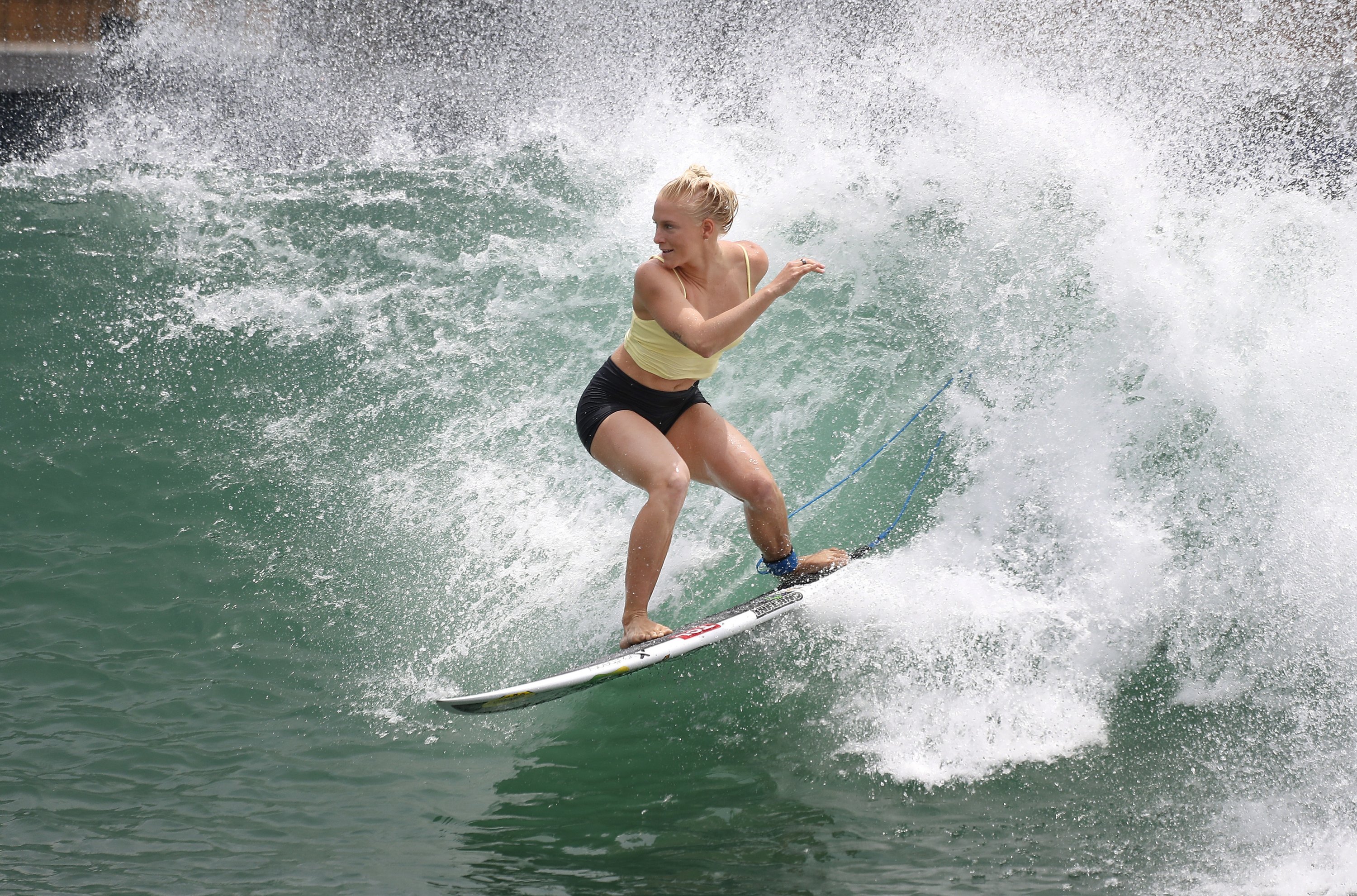 U.S. Surfer Tatiana Weston-Webb works out on a Surf Ranch wave during practice rounds for the upcoming Olympics, in Lemoore, California, U.S., June 16, 2021. (AP Photo)