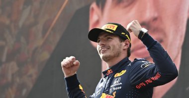 Red Bull's Dutch driver Max Verstappen celebrates on the podium after winning the Austrian Formula One Grand Prix at the Red Bull Ring racetrack in Spielberg, Austria, July 4, 2021. (AP Photo)