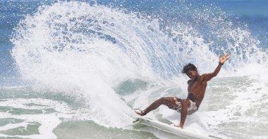 A surfer in action on Garza Beach, in the province of Guanacaste, Costa Rica, June 23, 2021. Surfing will make its debut at the Tokyo 2020 Olympics. (EPA Photo)