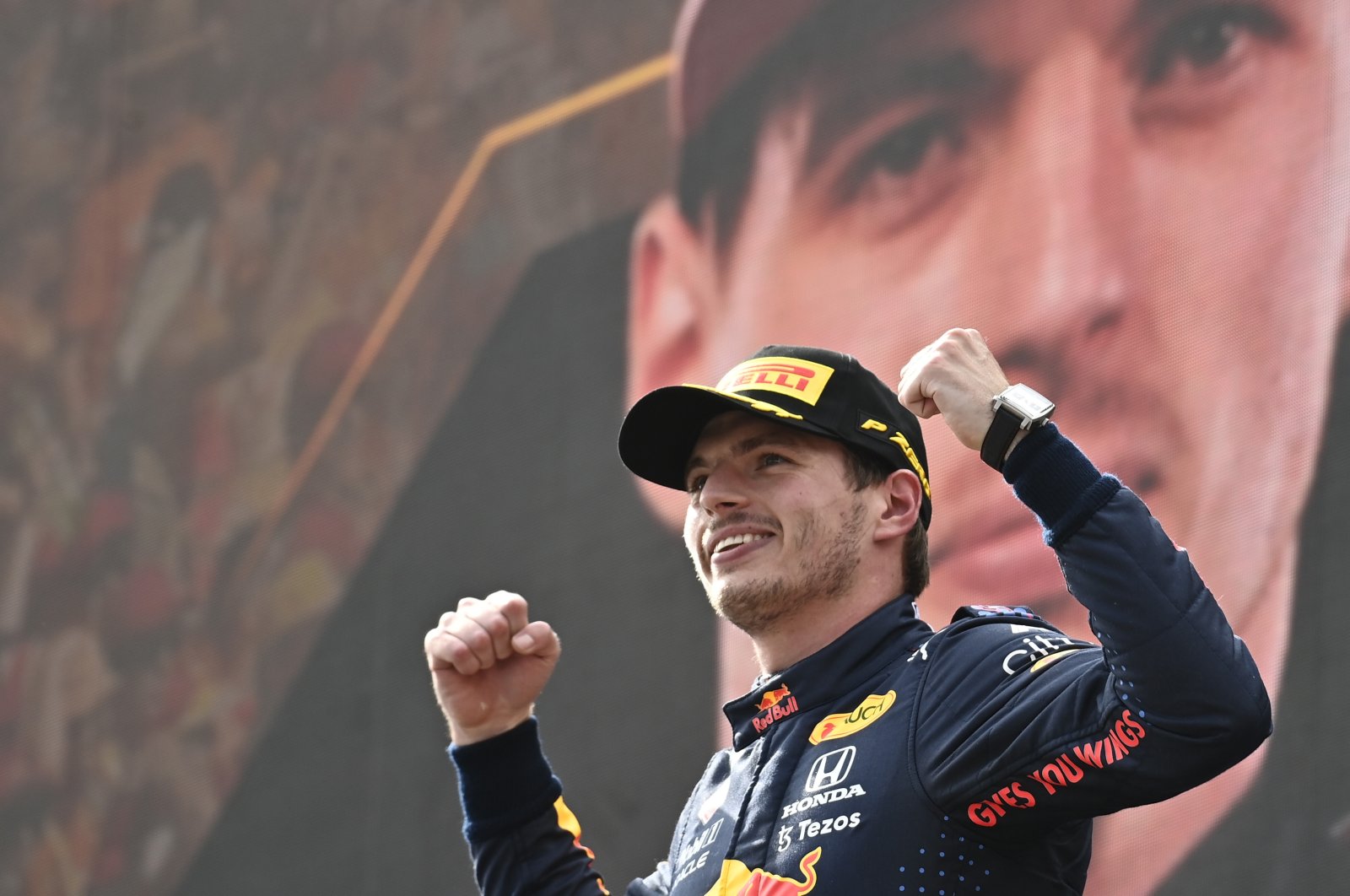 Red Bull's Dutch driver Max Verstappen celebrates on the podium after winning the Austrian Formula One Grand Prix at the Red Bull Ring racetrack in Spielberg, Austria, July 4, 2021. (AP Photo)