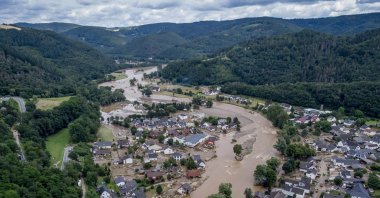 The Ahr river flows past houses destroyed by floods in Insul, Germany, July 15, 2021. (AP Photo)