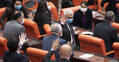 Then-HDP Deputy Ömer Faruk Gergerlioğlu waves after a session in the Turkish Parliament, Ankara, Turkey, March 17, 2021. (AA)