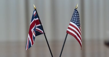 The flags of both countries are seen on the table during a meeting with Secretary of Defense Lloyd Austin and the United Kingdom Secretary of State for Defense Ben Wallace at the Pentagon, Monday, July 12, 2021, in Washington. (AP Photo/Alex Brandon)