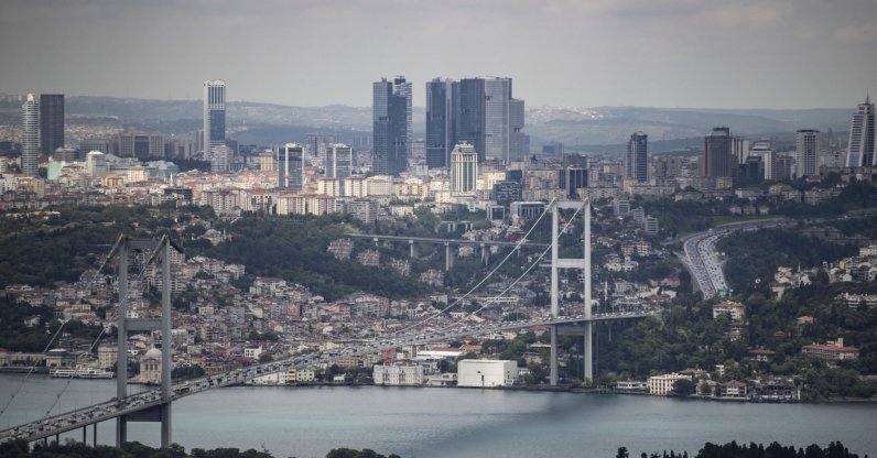 A view of the July 15 Martyrs Bridge, formerly known as the Bosporus Bridge, and surrounding buildings and skyscrapers, Istanbul, Turkey, May 28, 2020. (AA Photo)