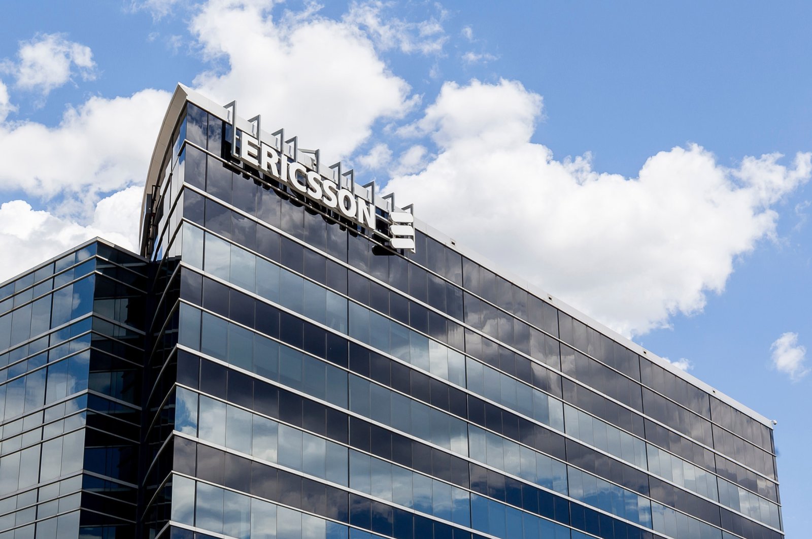 The company logo seen on the building of Ericsson Canada Corporate Office in Mississauga, Ontario, Canada, June 6, 2020. (Shutterstock Photo)