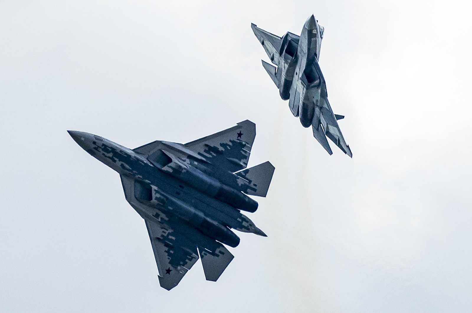 Russian Air Force Sukhoi Su-57 fifth-generation fighter jets perform during the MAKS-2019 International Aviation and Space Show in Zhukovsky, outside Moscow, Russia, Aug. 27, 2019. (AP Photo)