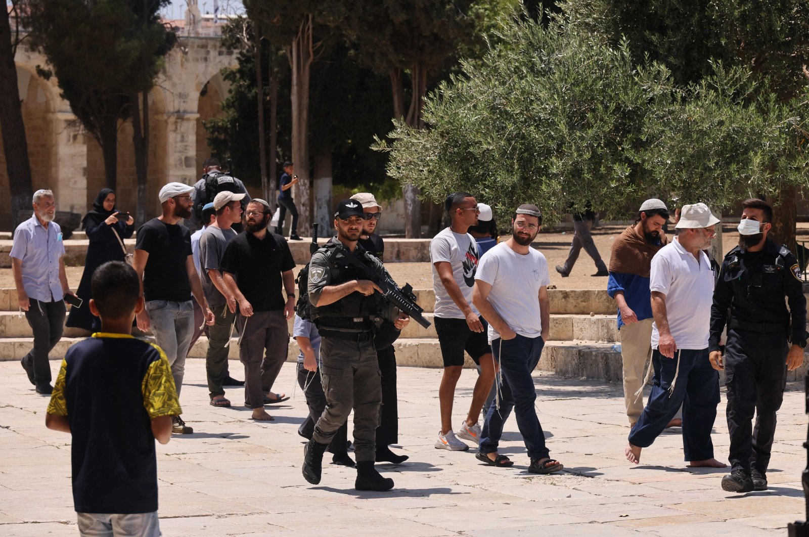 Members of the Israeli security forces stand guard, as a group of Orthodox Jews enter the Al-Aqsa mosque compound in Jerusalem, July 18, 2021. (AFP Photo)