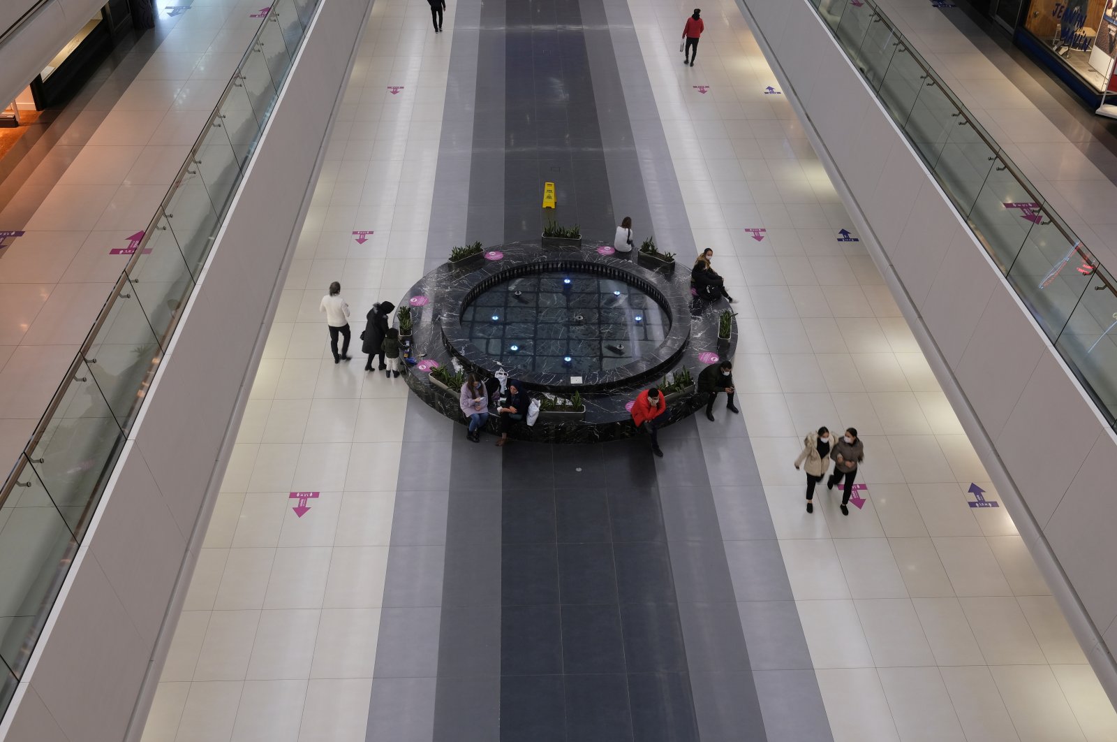 People are seen on the floor at a shopping mall in Istanbul, Turkey, Dec. 2, 2020. (Reuters Photo)
