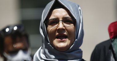 Hatice Cengiz, the fiancee of slain Saudi journalist Jamal Khashoggi, talks to members of the media in Istanbul, Turkey, July 3, 2020. (AP Photo)