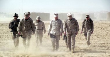 This November 2011 photo shows Gen. James Amos, commandant of the Marine Corps, in Helmand province in southern Afghanistan. (AP Photo)